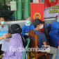 Vaksinasi yang digelar BIN Jatim dan sejumlah instansi di Desa Plandi, Kecamatan/ Kabupaten Jombang, Jumat (10/12/2021). 
