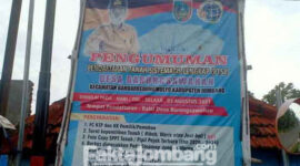 Baliho pengumuman PTSL desa Barongsawahan, Kecamatan Bandar Kedungmulyo, Kabupaten Jombang, yang terpasang di area permukiman warga, kala itu. 